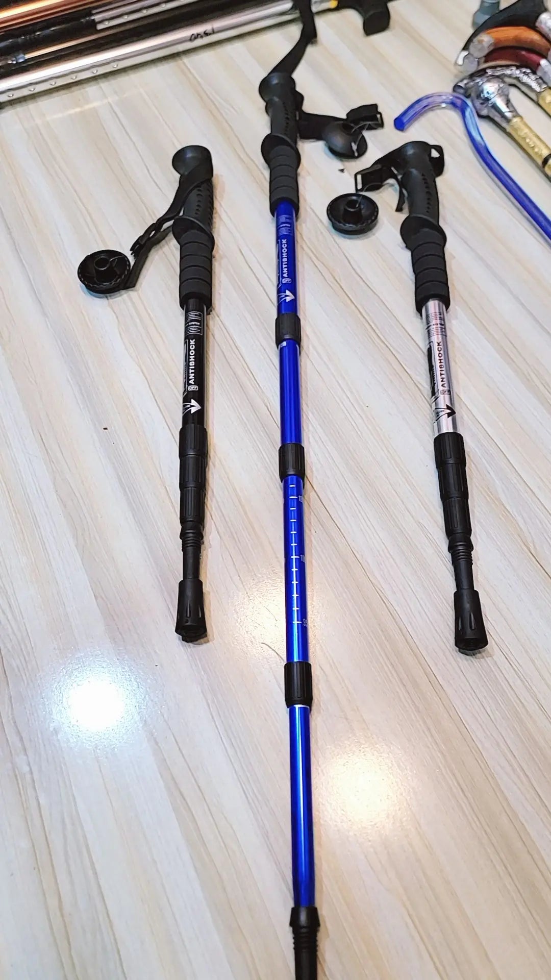 Anti-Shock Walking Stick for Hiking & Elderly Support – Blue, Black, White | Lalaimport.pk