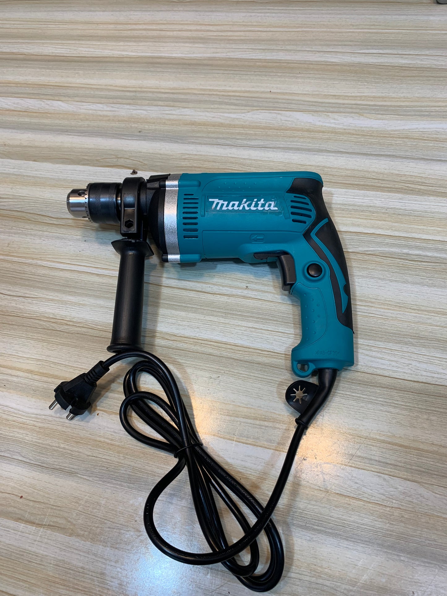 Buy the Makita HP1630 Electric Drilling Machine in Pakistan at the best price. 780W motor and 48,000 RPM for precision and speed.