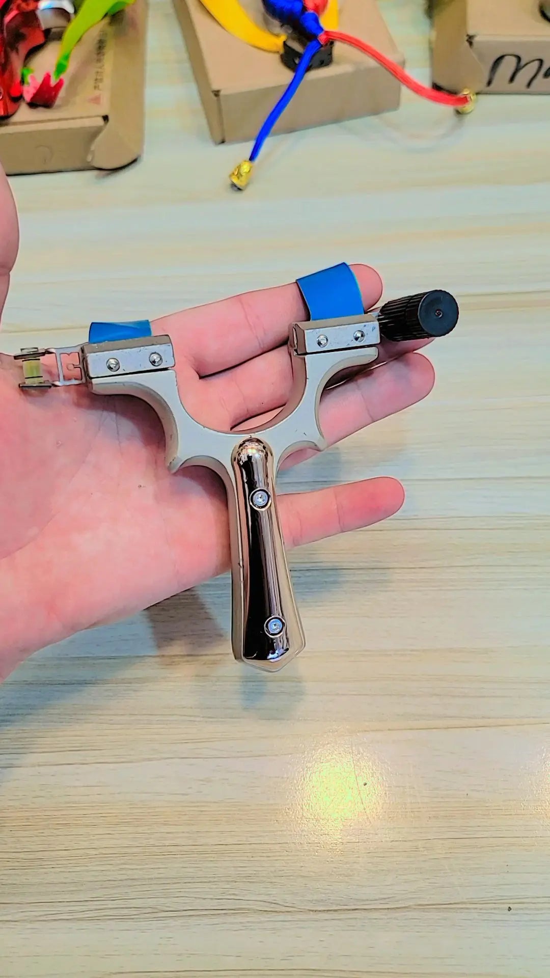 Steel Slingshot with with laser and water level | Lalaimport.pk