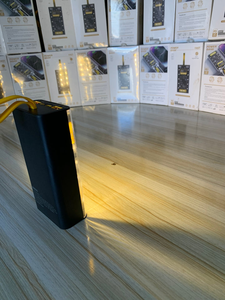 High-capacity 20000mAh power bank with 66W fast charging, digital display, and built-in torch available in Pakistan – Perfect for smartphones, tablets, and laptops from Lalaimport.pk.