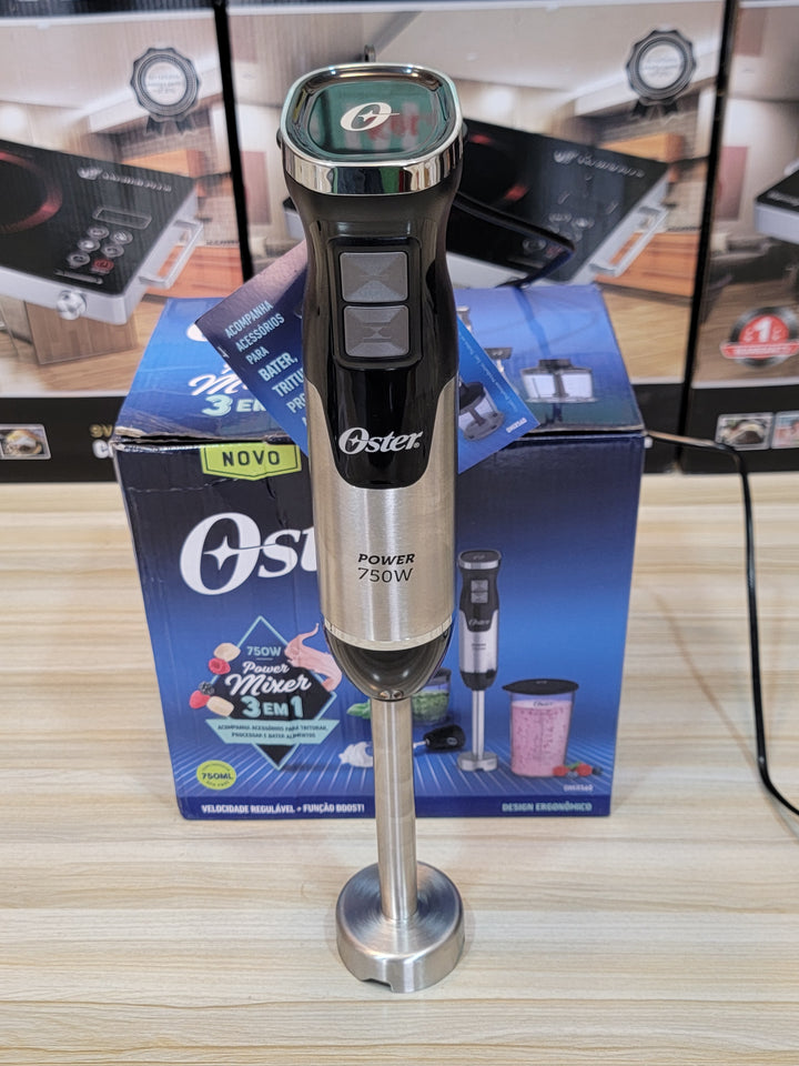 Hand blender in action, blending lassi in the included pot, demonstrating its efficiency and versatility for everyday use in Pakistani kitchens.