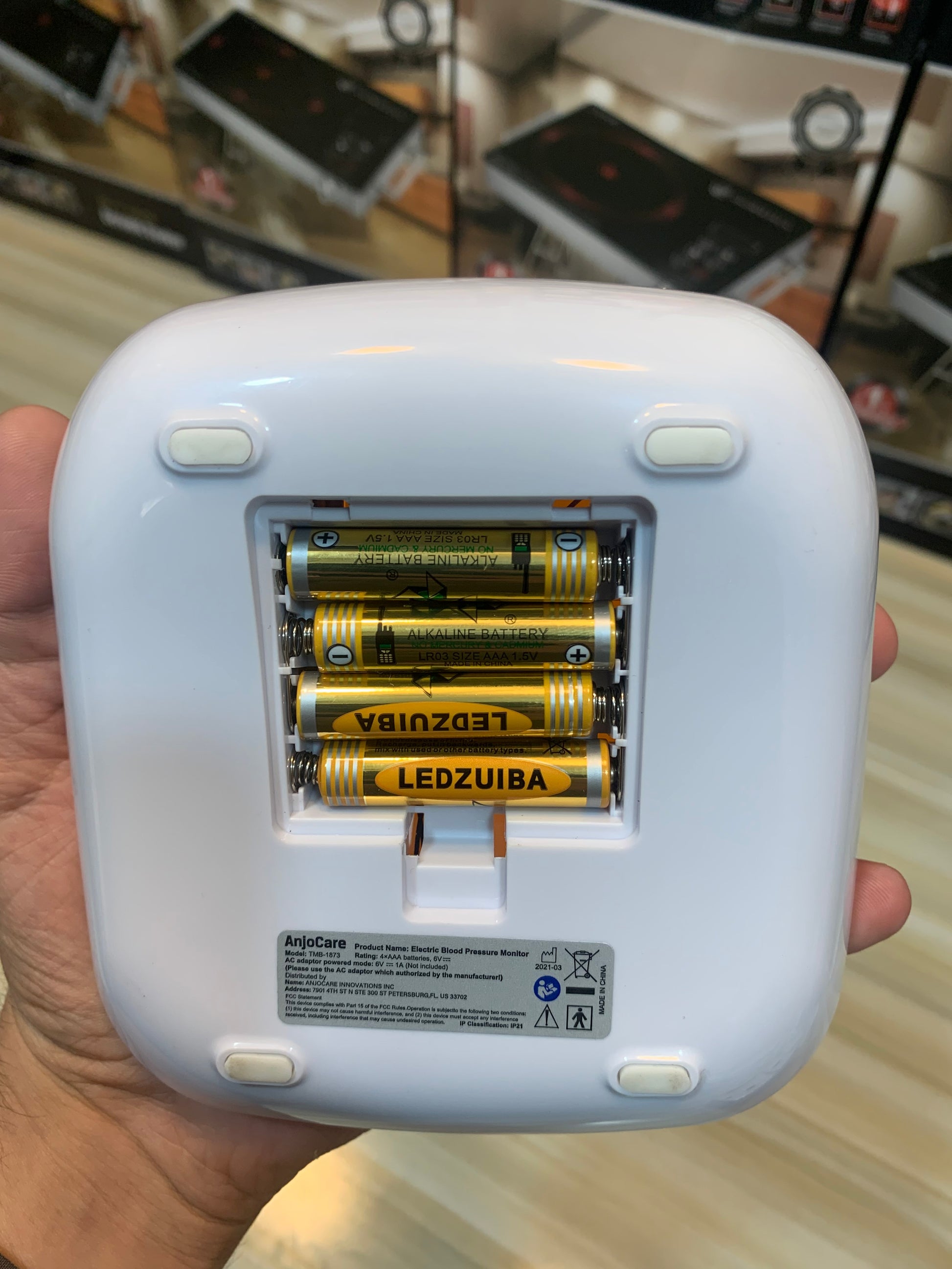 Close-up of the electric blood pressure machine showing its easy-to-read large display, ideal for quick and accurate readings.