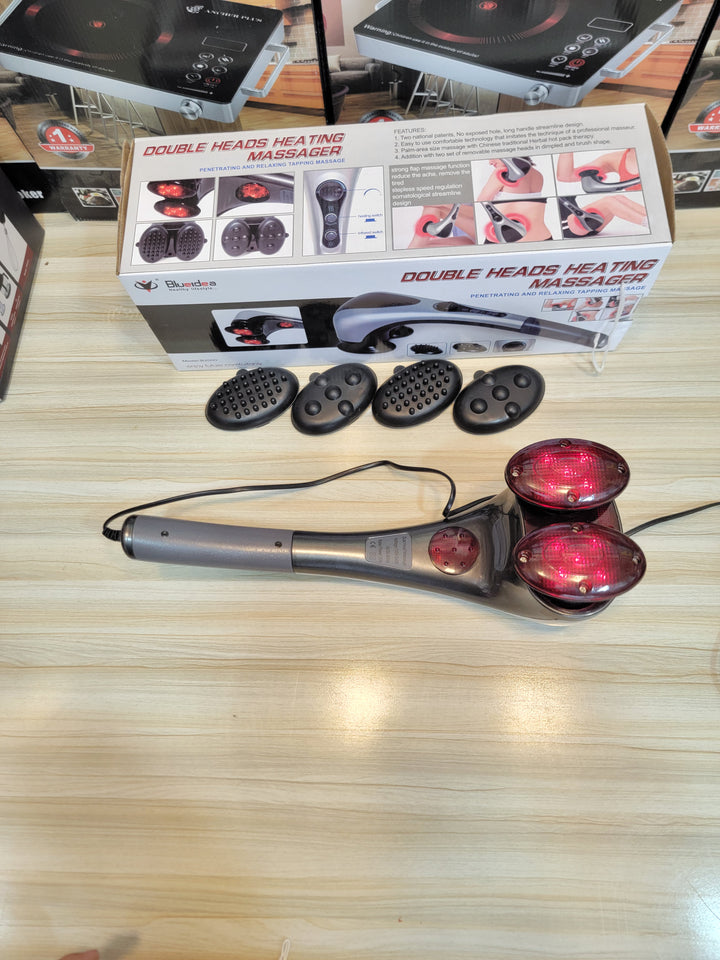 Box packaging of Double Head Heating Massager B2000 imported by Lalaimport.pk, trusted since 1995.