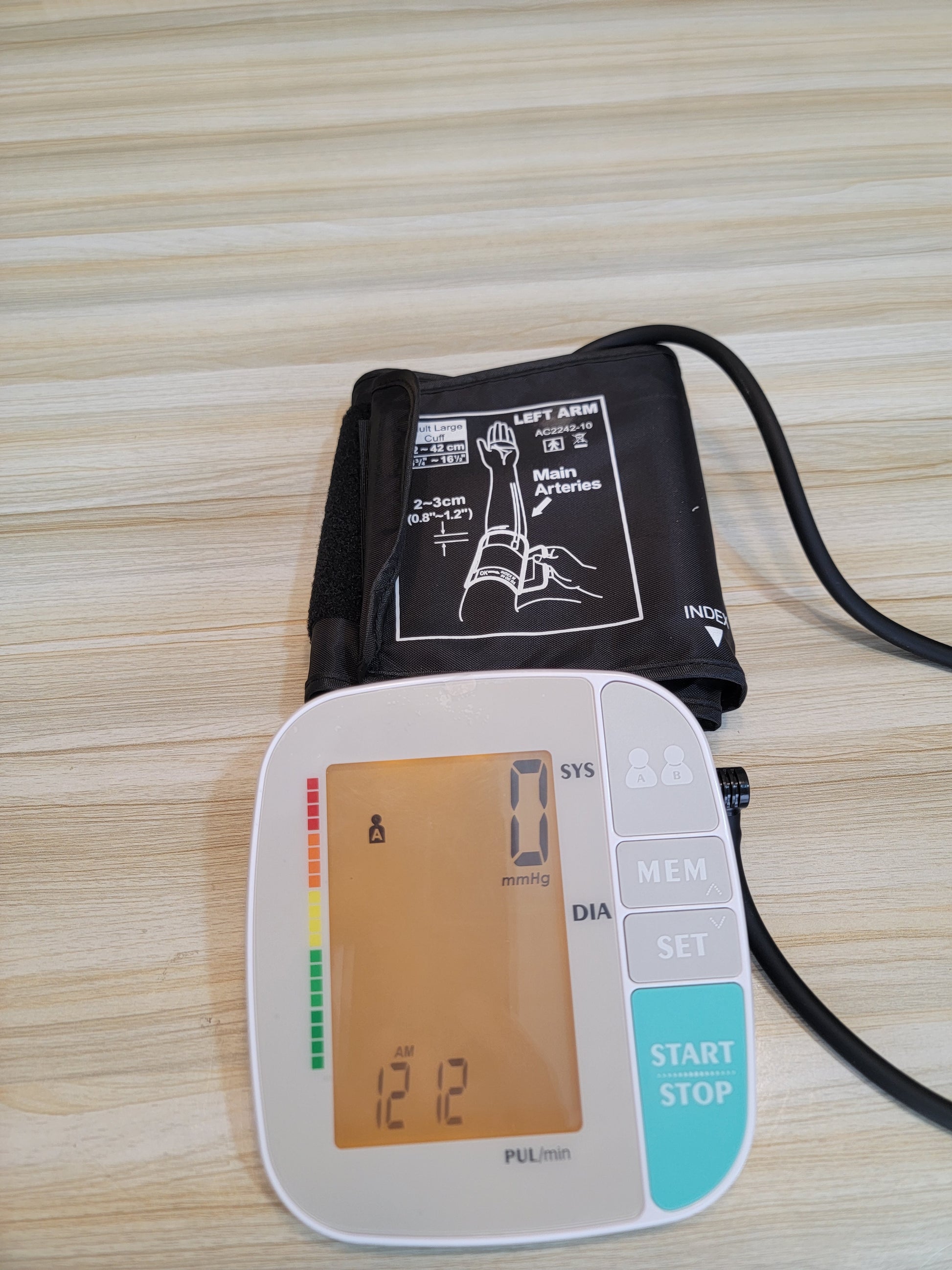 Packaging of the electric blood pressure machine, highlighting its secure packaging and authenticity as a trusted health device from Karkhano Market.