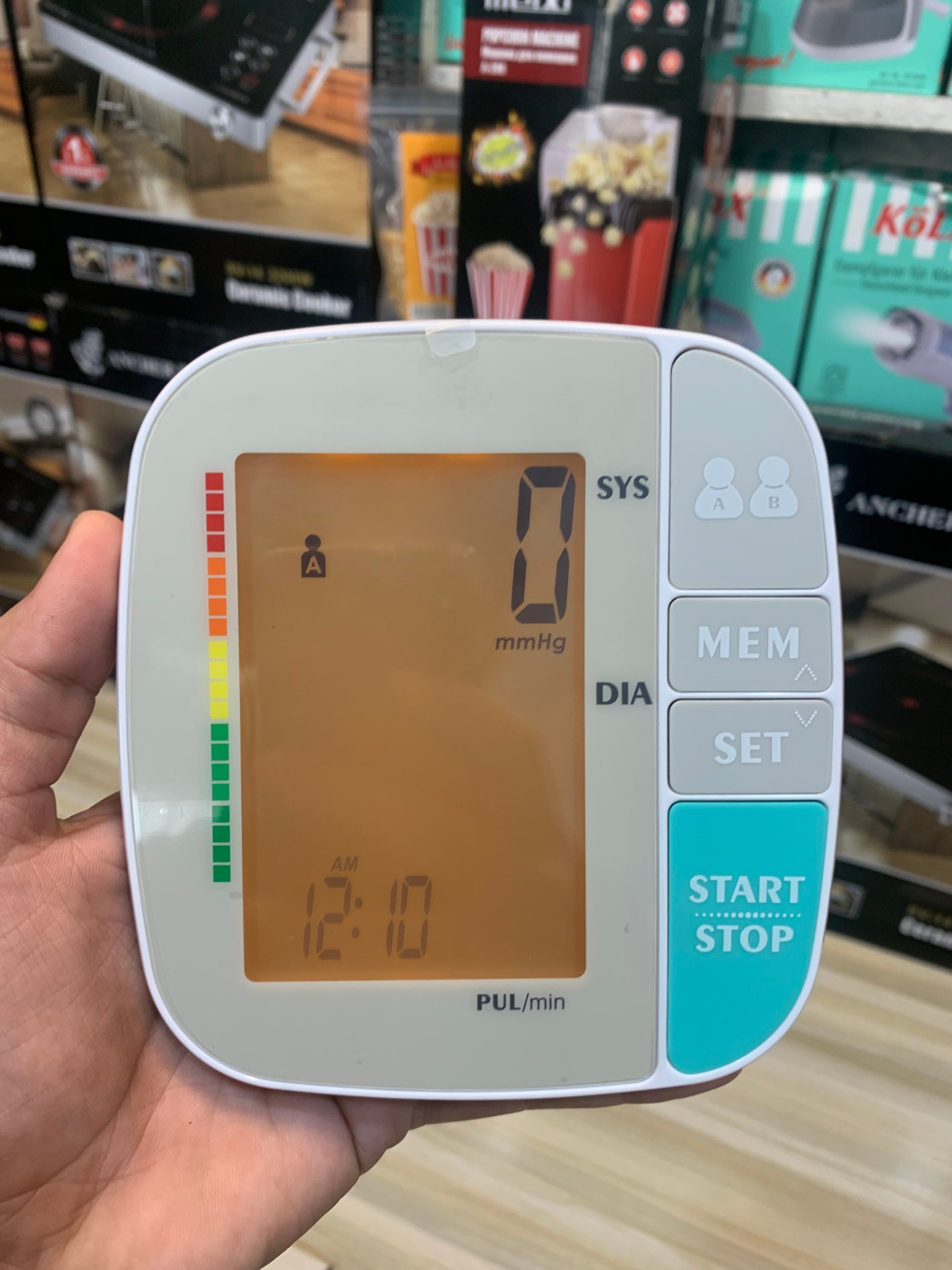 Electric blood pressure machine with large display, designed for accurate, at-home health monitoring for all ages.


