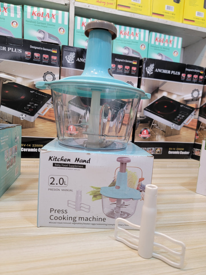 Multi-function vegetable cutter being used to chop vegetables, perfect for Pakistani kitchens.