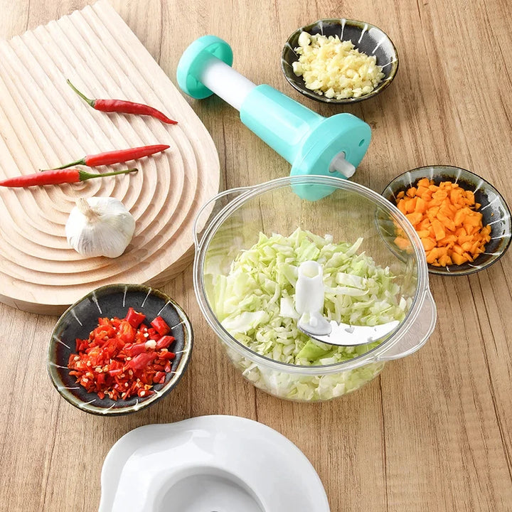 2-liter vegetable cutter with secure lid and ergonomic press handle for safe and easy operation.